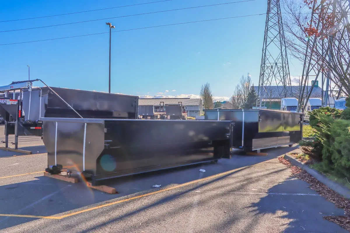 Roll-off dumpster ready for waste disposal at job site for Yard Waste Dumpster Rental in Independence